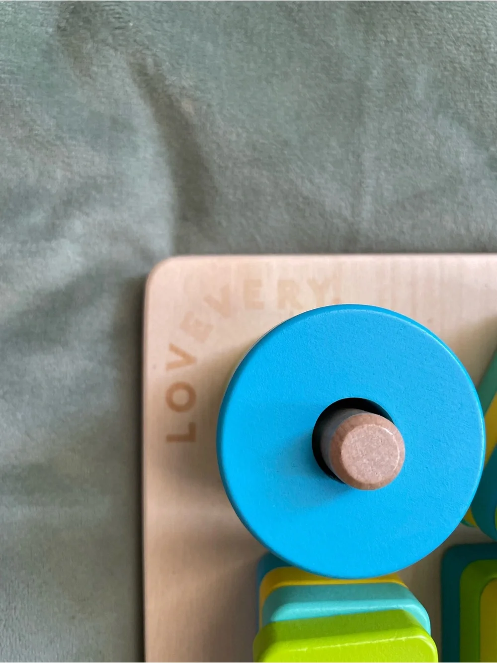 Wooden Shape Sorting & Stacking Toy in Blue and Lime Puzzle